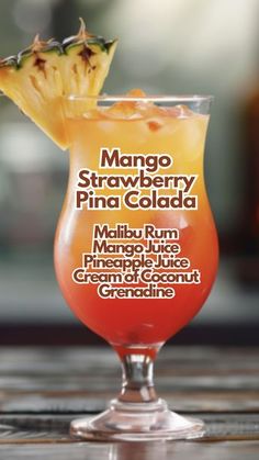 a close up of a drink in a glass with fruit on the rim and text that reads mango strawberry pina cola