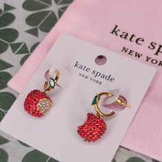 Brand New With Tags Kate Spade Apple Of My Eye Huggie Earrings. Comes With Dust Bag. Same Or Next Day Shipping Plated Metal Gold Polished Glass, Cubic Zirconia Weight: 9.6g Bullet Clutch Closure Sterling Silver Post Total Drop Length: 0.9“ Width: 0.45” Kate Spade Red Earrings For Gift, Elegant Red Kate Spade Jewelry, Kate Spade Drop Earrings As Gift, Red Kate Spade Jewelry As Gift, Kate Spade Dangle Earrings As A Gift, Kate Spade Dangle Earrings For Gifts, Dangling Earrings Gold, Kate Spade Earrings Stud, Glitter Stud Earrings