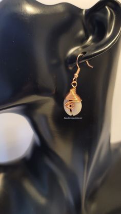 Simple Cowrie Shell wire wrapped Earrings Why copper? Copper is a conductor of energy and works wonders when paired with healing crystals. Copper has healing properties itself. For example, not only is it a natural and necessary agent found in the body but it aids in mineral absorption, helps with arthritis, has anti-inflammatory and great anti-aging properties. Most importantly is help with proper immune function and help prevent the spread of viruses. Please do your own research on this wonder Adjustable Wire Wrapped Crystal Earrings, Adjustable Wire Wrapped Spiritual Earrings, Loc Jewelry, African Earrings, Wire Wrapped Rings, Copper Rings, Cowrie Shell, Wire Wrapped Earrings, Shell Jewelry