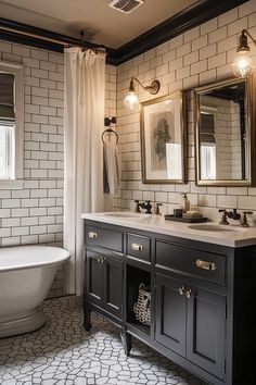 a bathroom with two sinks, a tub and a mirror on the wall above it