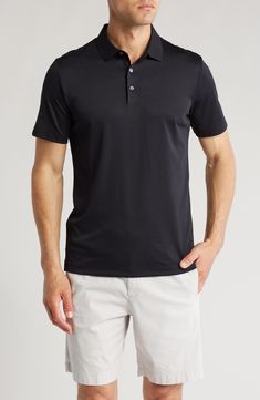 Add a classic staple to your wardrobe with this short-sleeve polo that is cut from a comfortable cotton-blend. 28" length (size Small) Button half-placket Spread collar Short sleeves 60% polyester, 40% cotton Machine wash cold, tumble dry low Made in Peru Model stats: 6'1" height, 32" waist. Model is wearing size Small. Short Sleeve Polo, Peru, Nordstrom Rack, Polo Shirt, Cotton Blend, Short Sleeves, Nordstrom, Size Medium, Mens Outfits