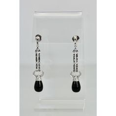 This is part of Chairish’s Fine Jewelry assortment.  These lovely earrings are set with round Diamonds, baguette Diamonds and pave Diamonds all with an Onyx drop. They are 2 1/4" long, Onyx is 9.17cm wide x 12.55cm long and weight 11.9 grams. These earrings are from Spain and the setting is gorgeous, baguettes alternate between round Diamonds with a pave of Diamonds heading the Onyx. Perfect you will keep these in your collection forever. I love black onyx and I do have a few important pieces bu Evening Diamond Chandelier Earrings, Classic Chandelier Earrings With Diamond Accents For Evening, Timeless Evening Bridal Earrings With Cubic Zirconia, Timeless Bridal Earrings With Diamond Accents For Evening, Luxury Pierced Chandelier Earrings For Formal Events, Luxury Teardrop Diamond Earrings For Evening, White Gold Drop Chandelier Earrings For Evening, White Gold Chandelier Earrings For Formal Occasions, Luxury Teardrop Chandelier Earrings For Formal Occasions