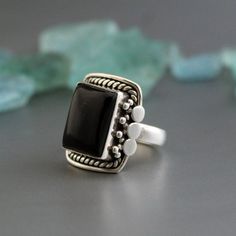 ■ M A T E R I A L S ∙ A N D ∙ S I Z E ✦✦ Gemstone: Black Onyx ✦✦ Stone Cut: Rectangle Cabochon ✦✦ Metal: 925 Sterling Silver ✦✦ Handmade Item ✦✦ we use natural Gemstones, they can vary slightly in shape, size and color. That is what makes every Piece so unique! ✦✦  As all products are handmade you will get identical product as displayed in the listing Benefits of Black Onyx ---------------------------------------- Natural Birthstone of December Black Onyx Promotes Divine order, Amplifies intenti Adjustable Sterling Silver Ring With Rectangular Stone, Bohemian Jewelry With Rectangular Gemstone, Handmade Rings With Rectangular Stone For Anniversary, Adjustable Rectangular Jewelry For Wedding, Bohemian Rectangular Gemstone Jewelry, Handmade Anniversary Ring With Rectangular Stone, Vintage Adjustable Rectangular Ring, Adjustable Rectangular Wedding Jewelry, Bohemian Sterling Silver Ring With Rectangular Shape