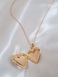 The most perfect heart locket and yes you can add a cute picture in there! Details Length: 18in Pendant: 29.4 x 19.3 mm Materials 18k gold filled Hypoallergenic Lead and nickel free Care For the best care of your product, remove before showering. Avoid excessive use of lotions and sanitizers, best to apply before adding your jewelry. Wipe down your jewelry with a soft, lint-free polishing cloth (we provide one) and stored in a safe dry place. Gold Hypoallergenic Heart Necklace As Gift, Gold Hypoallergenic Heart Necklace For Gifts, Heart-shaped Gold Necklace For Best Friend, Gold Heart Pendant Necklace For Best Friend, Gold Locket Necklace For Valentine's Day Best Friend Gift, Gold Locket Necklace For Best Friend On Valentine's Day, Heart Shaped Locket Necklace For Best Friend, Heart-shaped Locket Necklace For Best Friend, Heart Locket Necklace For Best Friend