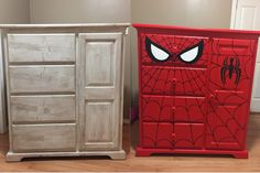 two children's dressers with spider - man painted on them, one in white and the other in red