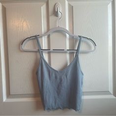 Light Blue V-Neck Tank Top From Pacsun. It Is New With Tags, Has Never Been Worn, And Is In Perfect Condition. Seamless V-neck Tank Top For Day Out, Seamless V-neck Crop Top For Day Out, Light Blue V-neck Tank Top For Summer, Blue V-neck Tank Top For Summer, Light Blue Seamless Tank Top For Spring, Summer Blue V-neck Tank Top, Blue V-neck Summer Tank Top, Blue V-neck Tank Top For Vacation, Casual Blue V-neck Crop Top