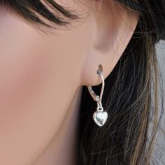 Sterling silver leverback Earrings. Sterling silver puff heart dangle earrings. IT is made with ... -Sterling silver 7mm Heart puff Charm, -Sterling silver Lever back , -Come up with small ribbon gift Box, -One set of care instruction package that enhance your present. More Earrings https://www.etsy.com/shop/rainbowearring?ref=listing-shop2-all-items-count§ion_id=11379567 PET JEWELRY https://www.etsy.com/shop/rainbowearring?search_query=paw+print ★How to Care Sterling Silver . ~The best thing yo Elegant Hoop Heart Charm Earrings, Dainty Heart Charm Hoop Earrings, Anniversary Heart Charm Dangle Hoop Earrings, Dainty Sterling Silver Hoop Earrings With Heart Charm, Anniversary Dangle Hoop Earrings With Heart Charm, Valentine's Day Heart Charm Dangle Hoop Earrings, Valentine's Day Dangle Hoop Earrings With Heart Charm, Dainty Hoop Heart Earrings For Anniversary, Dangle Hoop Earrings With Heart Charm For Gift