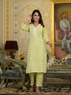 Grab this beautiful 3-piece set. The set comes with chikankari straight shape kurta has v neck, 3/4th sleeves & calf length teamed with solid trouser pant elasticated waistband and a silk chiffon dupatta. Color - Lime Green Kurta Fabric-Cotton Blend Pant Fabric-Cotton Blend Dupatta Fabric - Silk Chiffon Neck-V Neck Sleeves-3/4th Sleeves Work -Embroidery & Print Detailing Washing Instructions-Dry Clean DISCLAIMER - The color of the product may be differ due to screen settings of device. A misprint here and a color drop slip there is the beauty of printing which is not treated as a defect. V-neck Chikankari Embroidery Sets For Diwali, Diwali V-neck Sets With Chikankari Embroidery, Diwali V-neck Chikankari Embroidery Sets, Navratri V-neck Set With Chikankari Embroidery, Traditional V-neck Kurta With Self Design, Eid Straight Kurta Set With Chikankari Embroidery, Traditional V-neck Kurta With Chikankari Embroidery, Fitted V-neck Kurta With Chikankari Embroidery, Chikankari Embroidered Straight Kurta Set In Mulmul