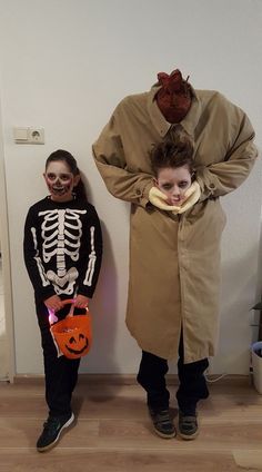 two children in costumes standing next to each other with their faces painted like skeletons and pumpkins