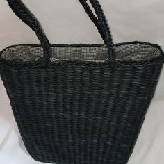 This Woven Straw Tote From Old Navy Is The Perfect Beach Bag! Cute Gingham Blue And White Print Cloth Lining On Inside, One Inside Pocket. Excellent Condition. Never Used. A Couple Of Loose Spots, Pictured. Opening Is Approximately 13.5" Across, Stretches To Approximately 7" Depth. Exterior Is Approximately 14" Wide At Top, Tapers To 10" At Bottom, Straps Are 9" Tall, Making This The Perfect Shoulder Bag For Your Beach Day! Color As Pictured, Appears Black Or A Very Dark Blue. Black Woven Satchel Shoulder Bag, Black Handheld Beach Bag For Travel, Black Straw Bag For Daily Use With Large Capacity, Black Straw Bag With Large Capacity For Daily Use, Black Large Capacity Straw Shoulder Bag, Black Woven Satchel Straw Bag, Black Woven Straw Satchel Bag, Black Woven Shoulder Bag With Double Handle, Black Large Capacity Straw Bag For Daily Use