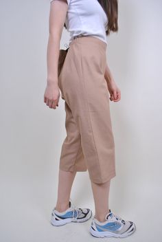 "90s beige chino capris, vintage women straight long shorts, Size W 34 Welcome to TARASCOMMON.ETSY.COM Unique clothing from the 20th century. Model tall 170cm. Size: FR/B - 44; Eur - 42; UK 16; Width - 39-49cm / 15.35-19.29inch; Length - 80cm / 31.49inch. All measurements are taken seam to seam while lying flat. Cotton. Polyester. This item is vintage, so it can have some defects. Additional photos can be send We are glad that you are interested in lots that we sell. Wish you a good shopping! FO Beige Capri Pants Outfit, Spring Workwear Capris, Knee-length, Khaki Knee-length Spring Bottoms, Spring Workwear Knee-length Capris, Spring Khaki Knee-length Bottoms, Chic Cotton Knee-length Shorts, Spring Knee-length Capris For Workwear, Beige Wide Leg Cotton Capris, Wide Leg Beige Cotton Capris