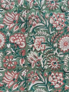 a green and red floral print fabric