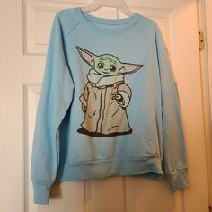 Nwt Blue Star Wars Sweatshirt With Baby Yoda. New, Never Worn. Blue Cartoon Print Sweatshirt For Streetwear, Blue Casual Sweatshirt With Cartoon Print, Blue Casual Sweatshirt With Character Print, Casual Blue Sweatshirt With Character Print, Blue Cotton Sweatshirt With Character Print, Blue Cotton Star Print Tops, Relaxed Fit Tops With Character Print For Loungewear, Blue Crew Neck Tops With Character Print, Cotton Sweatshirt With Character Print For Loungewear