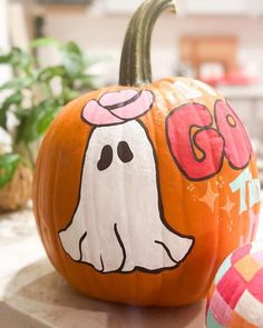 Halloween Decorations Painting Pumpkins For Halloween, Carving And Painting Pumpkins Ideas, Pumpkin Painting Ideas Minimalist, Pumpkin Painting Cheetah Print, Taylor Swift Themed Pumpkin Painting, Ghost Pumpkins Painting, Tiny Painted Pumpkins Ideas, Cute Pumpkin Painting Designs, Disco Ball Painted Pumpkin