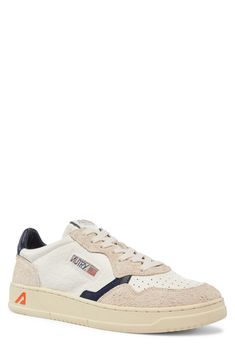 A vintage-inspired design elevates a sporty, distressed sneaker with smart perforations for breathable comfort. Lace-up style Removable, cushioned insole with arch support Leather upper and lining/rubber sole Imported Hair White, Sneaker Men, Vintage Inspired Design, Low Sneakers, White Hair, Up Styles, Mens Shoes Sneakers, Arch Support, Rubber Sole