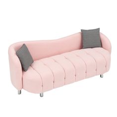 a pink couch with two grey pillows on it's back and one black pillow