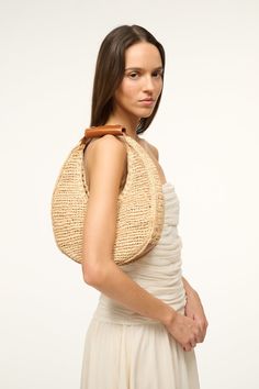 The perfect getaway bag. This Moon update features a natural woven raffia body and magnetic closure. This style is fully unlined. Spring Flats, Keds Champion, Custom Handbags, Moon Bag, Flat Heel Boots, Sandal Platform, Moon Shape, Raffia Bag, Woven Raffia