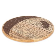 a wooden plate with a star wars map on it