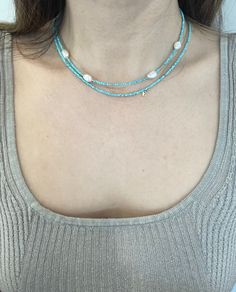 Hello :) I am so happy you stopped by! New designs are added weekly so check back often. All designs are handmade by this mommy.  Shop link ⬇️ https://enjewelrydesign.etsy.com This listing is for (1) turquoise & Pearl necklace.  DETAILS: * Sold as (1) Necklace** please check out the length before purchasing.  * Materials: Natural Turquoise Faceted Gemstone Beads with a  Fresh Water Pearls OR just turquoise beads.   Please note each pearl charm is unique and different in shape and size. And some pearls might have some imperfections.  * **Length: Approximately 15.5" (end to end, including the clasp)  - Please note fit and appearance will vary based on the individual. PLEASE READ BEFORE PURCHASING * NO RETURN/EXCHAGE  * Please contact me within 3 days of delivery if you have any issues with y Handmade Light Blue Necklaces For Summer, Handmade Light Blue Necklace For Summer, Dainty Blue Necklaces For Summer, Everyday Blue Bohemian Beaded Necklace, Everyday Bohemian Blue Beaded Necklace, Handmade Light Blue Beaded Necklace For Summer, Handmade Blue Necklace For Summer, Double Strand Turquoise Beaded Necklace For Beach, Turquoise Double Strand Beaded Necklace For Beach