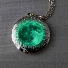 Space, galaxies, stars..Real full moon glow in the dark  locket necklace. the Universe's most beautiful creations. This pendant captures the unique beauty of the Moon, like looking into the window of space.  Perfect necklace for full moon night events!  Charge this pendant in the sunlight, or a bright bulb, and it will glow bright for several hours. It will even glow in dim lighting with a good sun charge. The glow will gradually fade until recharged. This locket measures 1.25 inches (30mm) in d Glowing Moon, Waxing Moon, Full Moon Night, Birthday Jewelry, Comme Si, Moon Glow, Moon Jewelry, Necklace Personalized, Locket Necklace