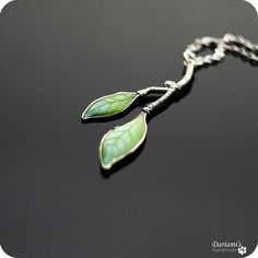 "This spring green necklace is very tender and feminine. Matched earrings are here: http://www.etsy.com/listing/126824630 - Size: around 5 cm / 2\" lobster clasp - Please give an allowance for slight difference in size, shape and tint since each piece is individually handmade. - Each purchase comes carefully packaged. -Please note that real colors may slightly differ from their appearance on your display." Tampa Fl, Green Necklace, Spring Green, May 11, Green Leaves, Pendant Necklaces, Lobster Clasp, Tampa, Silver Rings