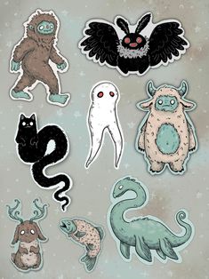 some stickers that are on top of a paper sheet with animals and other things