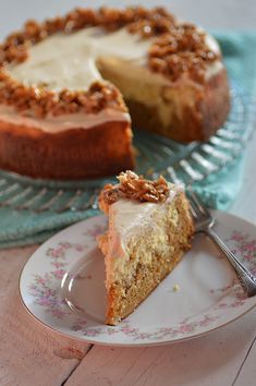 a piece of cake sitting on top of a plate next to a slice of pie