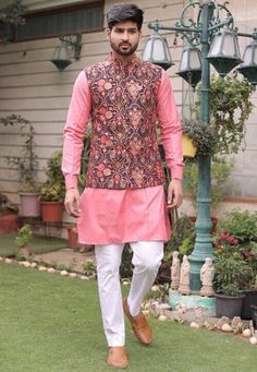 Faux Georgette Nehru Jacket in Wine. This Readymade Chinese Collar Neck and Sleeveless attire is Enhanced With Fancy Buttons, Pockets, Mirror Effect, Resham and Sequins WorkDo note: Kurta, Bottom and Footwear shown in the image is for presentation purposes only. Half to one inch may vary in measurement. (Slight variation in actual color vs. image is possible)  We sell all kinds of menswear. Mens Kurta | Mens Kurta Pajama | Mens Sherwani | Mens Sherwani Sets | Traditional Menswear | Partywear Men Fitted Pink Nehru Jacket With Floral Embroidery, Festive Pink Nehru Jacket With Intricate Embroidery, Fitted Pink Embroidered Nehru Jacket, Festive Embroidered Sleeveless Outerwear, Festive Nehru Jacket With Stand Collar For Fall, Embroidered Pink Nehru Jacket For Transitional Season, Embroidered Pink Nehru Jacket For Festivals, Menswear Indian, Mens Dresses