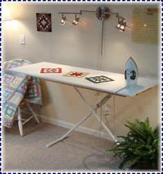 an ironing board and some lights in a room