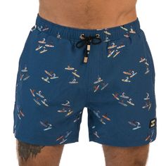 Ride the waves in style with our Caribbean Cove men's shorts. Inspired by the surf culture of the Caribbean, these shorts feature a trendy navy blue color scheme and a surf-inspired design. Perfect for the beach or the boardwalk, our shorts are made with high-quality materials that provide maximum comfort, durability, and flexibility. The elasticated waist and drawstring adjustment ensure a secure and comfortable fit, making them ideal for any activity. Whether you're surfing, swimming, or loung Navy Blue Color Scheme, Sustainable Sunglasses, Surf Culture, Blue Color Schemes, Navy Blue Color, The Caribbean, Resort Wear, Summer Wardrobe, Men's Shorts