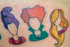 three different colored tattoos on the back of a woman's stomach, with an image of two women and one man