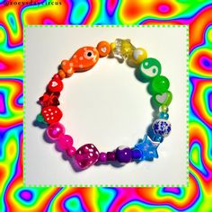 ⭐️Stretchy, handmade, and durable! All bracelets are made to order. 💖If ordered with no size request from the buyer, I will bead each bracelet to comfortably fit around a 6-7 inch wrist (average adult wrist size).  💐Feel free to msg me with ANY questions at all!! Colorful Handmade Rave Bracelets, Rainbow Rave Bracelets As Gift, Rainbow Beaded Bracelets For Gifts, Rave Style, Rainbow Beaded Bracelets For Rave Gift, Trendy Handmade Rainbow Stretch Bracelet, Rainbow Colored Rave Style Beaded Bracelets For Gifts, Cute Rainbow Stretch Bracelet With Round Beads, Multicolor Rave Stretch Bracelet Gift, Multicolor Rave Style Stretch Bracelet Gift