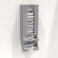 a group of batteries mounted to the side of a wall