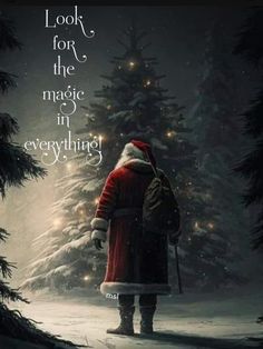 a santa clause standing in front of a christmas tree with the words look for the magic in everything