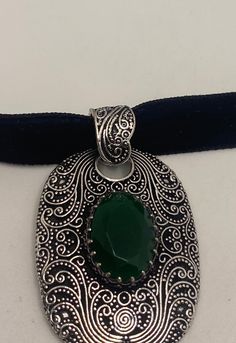 Very large ornate low content silver setting, Marker 925 but it is not. brilliant green emerald toned chrysoprase Over an inch long All jewelry is shipped in a nice gift box. Check out our over a THOUSAND great reviews Elegant Engraved Emerald Jewelry, Green Engraved Necklace For Collectors, Elegant Green Jewelry With Large Pendant, Handmade Victorian Jewelry With Oval Pendant, Victorian Handmade Oval Pendant Jewelry, Handmade Victorian Oval Pendant Jewelry, Vintage Oval Emerald Jewelry, Ornate Green Jewelry With Intricate Design, Green Oval Pendant Necklace With Engraving