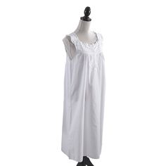 This Sleeveless Design Nightgown is a great addition to your sleepwear wardrobe. Made with 100percent cotton, it's very soft and comfortable, the ideal piece to lounge and sleep in. The ruffled d?collet? adds texture to the design, as well as a whimsical note, the perfect finishing touch for a white cotton nightgown. Size: medium. Gender: unisex. Age Group: adult. Cotton Ruffle Nightgown For Home, Cotton Nightgown With Ruffles For Home, Cotton Ruffled Nightgown For Home, Cotton Ruffled Sleepwear For Bedtime, Cotton Nightgown With Lace Trim For Sleep, Cotton Ruffle Nightgown For Sleepover, Cotton Ruffled Nightgown For Sleepover, Cotton Ruffled Nightgown For Bedtime, White Ruffled Cotton Nightgown