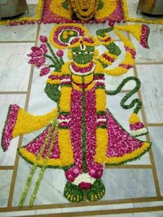 a decorated floor with flowers and decorations on it