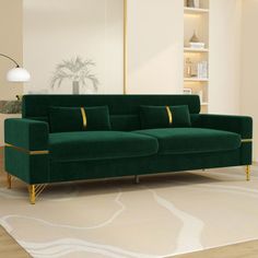 a green couch sitting on top of a white rug