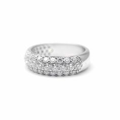 a white gold ring with three rows of diamonds