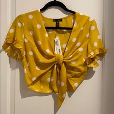 Never Worn With Tags! Yellow And White Polka Dot Top With Knot Tie Closure. Frilly Short Sleeve. Trendy Yellow Vacation Blouse, Trendy Yellow Blouse For Vacation, Trendy Yellow Summer Blouse, Frilly Shorts, White Polka Dot Top, Printed Peplum Top, Knot Tie, Black Sleeveless Blouse, Black And White Shirt