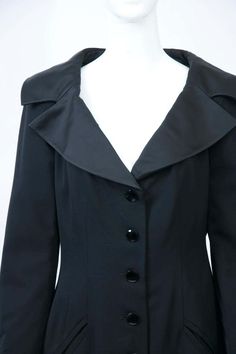 For Sale on 1stDibs - Jean Louis Scherrer classic black coatdress with tuxedo detailing in its taffeta spread collar and four-button wrists. The body is shaped with front and Classic Blazer Dress For Party With Notch Lapel, Fitted Tuxedo Blazer Dress For Semi-formal Occasions, Formal Tuxedo Style Fitted Blazer Dress, Formal Single-breasted Blazer Dress, Elegant Collared Semi-formal Blazer, Classic Blazer Dress With Hidden Button For Formal Occasions, Classic Single Breasted Blazer Dress For Formal Events, Classic Single-breasted Blazer Dress For Party, Classic Single-breasted Blazer Dress For Formal Occasions