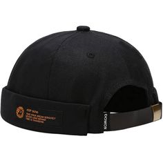 a black hat with an orange patch on it