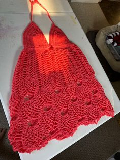 Crochet Swim suit cover up. Would fit a medium/large comfortable. Oversized on a small and tight on a XL. Fitted Open Knit Top As Beach Cover-up, One Size Crochet Lace Top For Beach, Stretch Pink Crochet Beach Top, Stretch Crochet Lace Top For Beach, Fitted Crochet Cover-up For Beach Season, Red Crochet Dress For Summer Beach, Vacation Crochet Lace Top One Size, Fitted Crochet Top For Beach Cover-up, Fitted Crochet Top For Summer Beach Cover-up