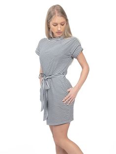 The Striped Short Sleeve T-shirt Dress with Pocket combines comfort and style in one effortlessly chic piece. Featuring a classic striped pattern and a relaxed fit, this dress is perfect for casual outings and everyday wear. The short sleeves provide a laid-back feel, while the pocket detail adds a touch of functionality and charm. Crafted from soft and breathable fabric, it offers all-day comfort and ease of movement. Whether paired with sneakers for a relaxed look or sandals for a summer day out, this dress is sure to become a go-to favorite in your wardrobe. Versatile and stylish, the Striped Short Sleeve T-shirt Dress with Pocket is a must-have for any fashion-forward individual. Striped Short, Summer Day, Striped Shorts, Pocket Detail, Striped Dress, T Shirt Dress, Breathable Fabric, Fashion Forward, Everyday Wear