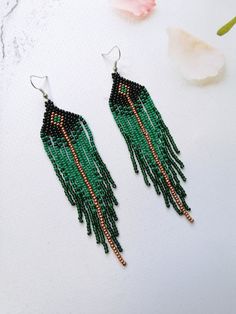 Unique green Czech bead earrings Length 4.6 inches(12 cm) Width1.1 inch(3cm) Green Teardrop Chandelier Earrings With Dangling Beads, Green Dangling Bead Chandelier Earrings, Elegant Green Long Drop Beaded Earrings, Green Fringe Dangle Jewelry, Green Beaded Dangle Chandelier Earrings, Green Beaded Fringe Chandelier Earrings, Green Tassel Dangle Chandelier Earrings, Green Tassel Drop Earrings With Dangling Beads, Green Fringe Round Bead Earrings