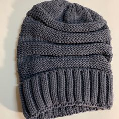 Women's/ Men’s Gray Knit Thick Beanie Baggy Oversize Winter/Ski Hat. New Without Tags. Gray Acrylic Beanie Casual Style, Slouchy Knit Beanie In Casual Style, Gray Knit Beanie For Cold Weather, Casual Gray Soft Knit Beanie, Gray Knit Beanie One Size, Casual One Size Cable Knit Beanie, Casual Chunky Knit Beanie One Size, Casual One Size Chunky Knit Beanie, Ski Hat