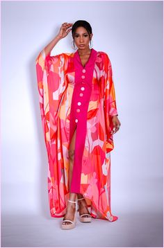 This super gorgeous kaftan. This dress is the perfect definition of a luxury kaftan. Has a belt inside that can be tight around the waist to give a nice snatch. Has button details that run in the middle. This Kaftan Fun and easy to wear. V-neck Satin Kimono For Party, Spring Party Kaftan With Kimono Sleeves, Pink Kaftan For Spring Evening, Pink Evening Kaftan For Spring, Chic Long Silk Kaftan, Party Kimono For Spring In Maxi Length, Silk Maxi Kaftan For Parties, Spring Party Kimono In Maxi Length, Chic Floor-length Kaftan For Vacation