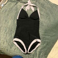 Super Cute Vintage Style Swimsuit. Never Worn, Nwot. This Suit Is Black And White, The Polka Dot One Is Just A Stock Photo To Show The Style. Halter Tie Behind The Neck And Full Coverage Bottom. Size Medium. Reposhing This Item I Purchased From @Harless10. Tried It On But It Didn’t Fit In The Bust (I’m Very Very Small Chested). Would Wear Like A True Medium. Questions? Leave A Comment Below! 50s Bathing Suit, 90s Swimsuit, 1950s Bathing Suits, 50s Swimsuit, Vintage Style Swimsuit, 1950s Swimsuit, Retro Revival, Vintage Bathing Suits, Vintage Swimsuit