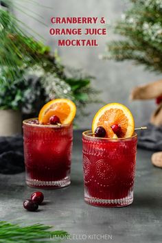 two red colored mocktails with orange and cranberry garnish Mocktail With Orgeat, Fall Wedding Drinks Non Alcoholic, Cranberry Orange Mocktail Recipe, Thanksgiving Non Alcoholic Drink, Orange Juice And Cranberry Juice Drinks, Cranberry Pineapple Mocktail, Maple Syrup Mocktail, Best Mocktails Fall, Fall Drinks Mocktail