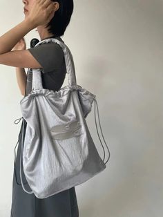 SPECIFICATIONSBrand Name: miyagawaOrigin: Mainland ChinaCN: AnhuiMain Material: POLYESTERLining Material: POLYESTERBackpacks Type: SoftbackInterior: Cell Phone PocketHandle/Strap Type: soft handleExterior: noneDecoration: noneClosure Type: stringTechnics: EmbossingCapacity: 20-35 LitreItem Type: BackpacksPlace Of Origin: China (mainland)Carrying System: Arcuate Shoulder StrapGender: WOMENRain Cover: NoModel Number: 6A327Style: fashionPattern Type: Solid Retro Purse, Lightweight Backpack, Bag Silver, Strap Bag, Wedding Bag, Elegant Red, Handbag Wallet, Casual Tote, Vintage Elegant